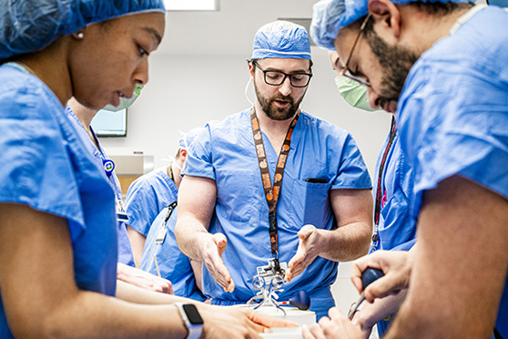 Robert Winkleman, MD, demonstrates with a 3D printed model
