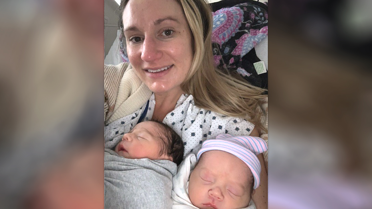 Christan with Jack and Ella when the kids were 1 day old.