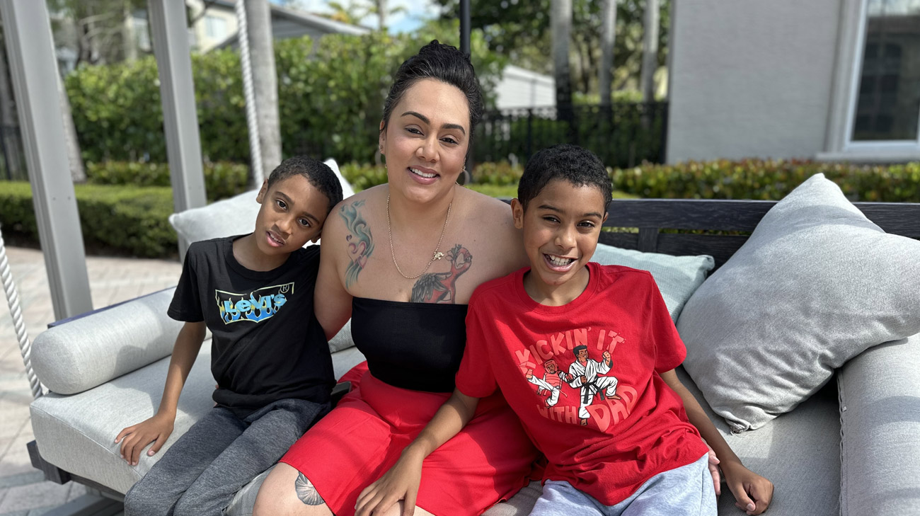 Amanda Cox (middle) and her two sons (right, left)