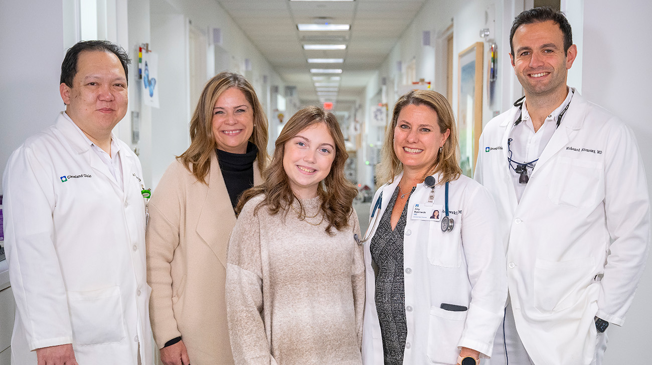 Riley with her mom and doctors at Cleveland Clinic