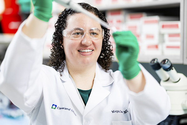 Megan Jack, MD, PhD in a laboratory at Cleveland Clinic